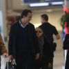 Exclusif - Mary-Kate Olsen et son fiancé Olivier Sarkozy à l'aéroport Roissy-Charles-de-Gaulle pour se rendre à New York après leur séjour à Paris, le 6 avril 2014.
