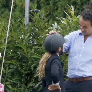 Olivier Sarkozy encourage sa femme Mary-Kate Olsen lors du jumping "Hampton Classic Horse Show " à Bridgehampton près de New York le 1er septembre 2016.