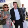 Christian Estrosi et sa femme Laura Tenoudji, enceinte, arrivent à l'aéroport de Nice à l'occasion du 70ème festival de Cannes le 17 mai 2017.