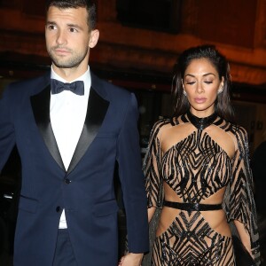 Nicole Scherzinger et son compagnon Grigor Dimitrov quittent la soirée des British Fashion Awards à Londres le 5 December 2016.