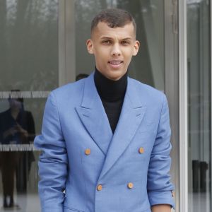 Stromae  à la sortie du défilé de mode "Louis Vuitton", collection prêt-à-porter automne-hiver 2015/2016, à Paris. Le 11 mars 2015