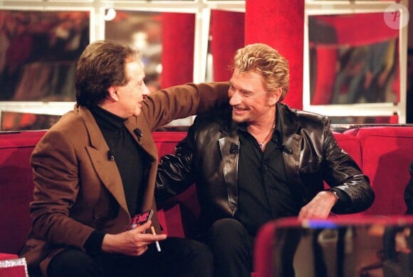 Michel Sardou et Johnny Hallyday dans Vivement Dimanche en 2000