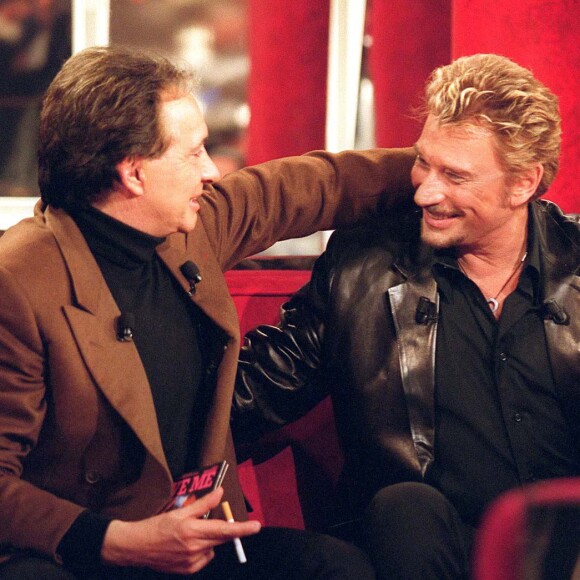 Michel Sardou et Johnny Hallyday dans Vivement Dimanche en 2000