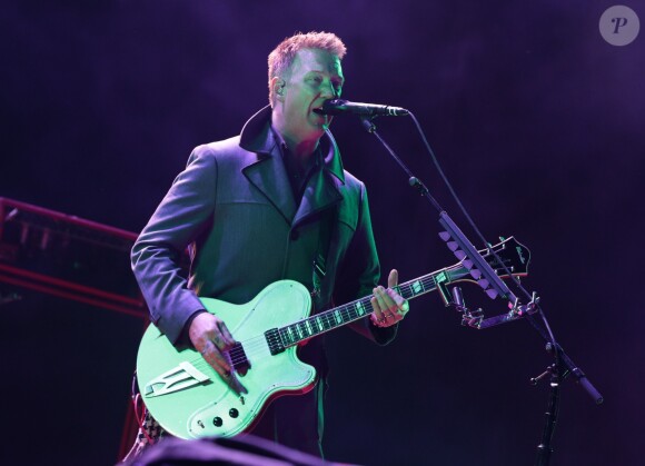 Josh Homme en concert avec Queens of the Stone Age en août 2014.