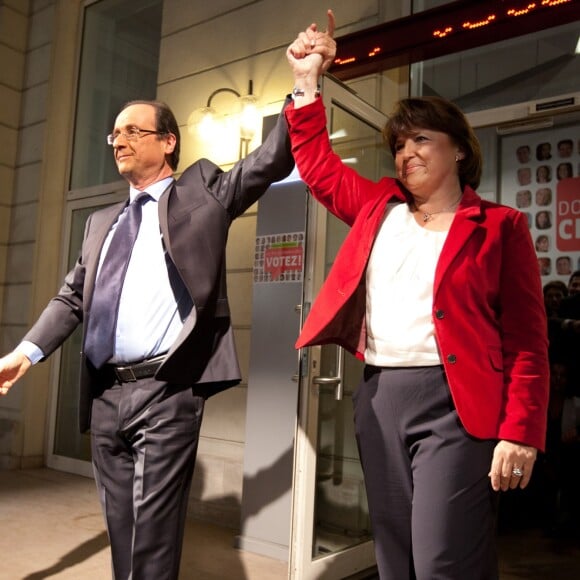 Francois Hollande et Martine au siège du PS rue de Solférino, le 16 octobre 2011