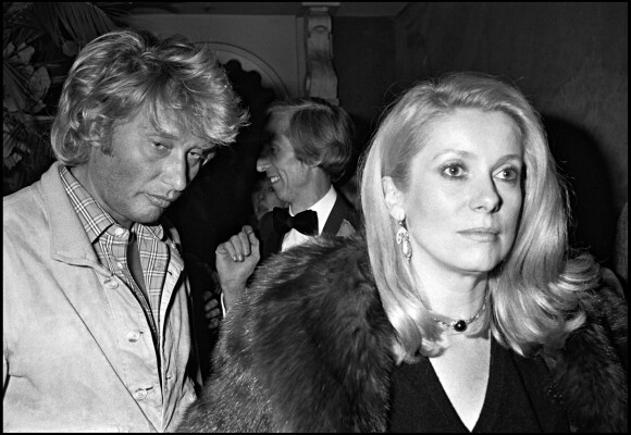 Johnny Hallyday et Catherine Deneuve en soirée en 1980 à Paris