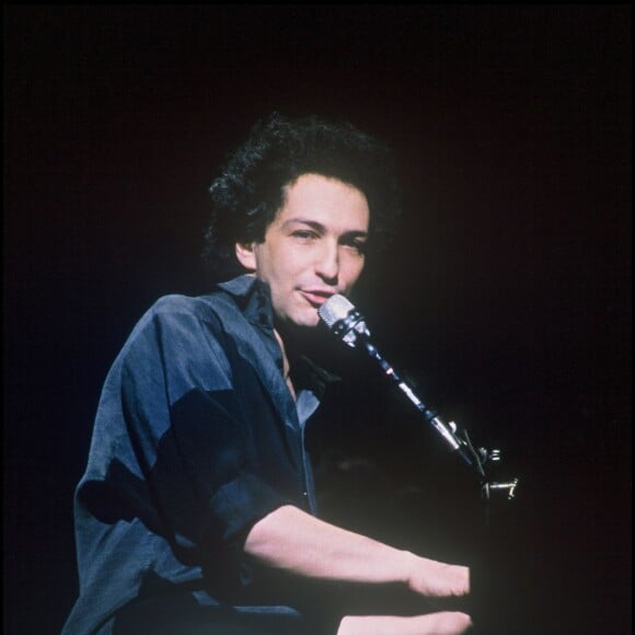 Michel Berger en concert à Paris, en 1986.