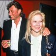 Johnny Hallyday et Sylvie Vartan, le soir de la première de leur fils David, le 9 mars 1991 à Paris.