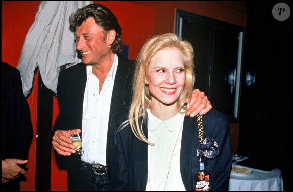 Johnny Hallyday et Sylvie Vartan, le soir de la première de leur fils David, le 9 mars 1991 à Paris.