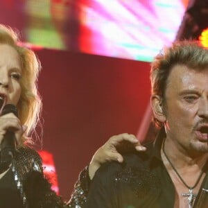 Sylvie Vartan et Johnny Hallyday au Stade de France pour le "Tour 66", le 31 mai 2009.