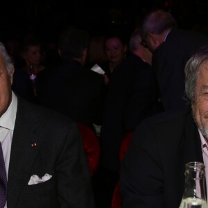Exclusif - Laurent Fabius et Jean-Louis Borloo - Dîner de gala de la fondation Akuo suivi d'un concert privé de M.Chedid avec le collectif LAMOMALI au cabaret Lido, à Paris, France, le 17 janvier 2018. La Fondation Akuo entreprend et soutient des projets de développement durable sociaux et environnementaux.Elle offre à ses partenaires la possibilité de s'engager à ses côtés, en faveur de populations défavorisées en France et dans le monde entier. La mission de la Fondation Akuo se décline en 4 domaines d'intervention: donner accès à des sources d'énergies renouvelables continues et durablement compétitives, donner accès à l'éducation et à la connaissance, donner accès à l'eau et aux services de santé et préserver l'environnement et la biodiversité. © Denis Guignebourg/Bestimage