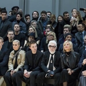 Lambert Wilson, Maria Grazia Chiuri, Robert Patinson, Karl Lagerfeld, Bernard Arnault et sa femme Hélène Mercier-Arnault, Pierre Niney et sa compagne Natasha Andrews - People au défilé de mode Dior Homme Automne-Hiver 2018-2019 au Grand Palais à Paris, le 20 janvier 2018. © Olivier Borde/Bestimage