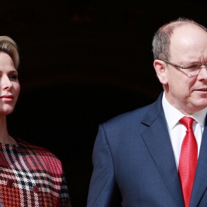 La princesse Charlene et le prince Albert II de Monaco au balcon du palais princier le jour de la célébration de Sainte Dévote à Monaco. Le 27 janvier 2018 © Claudia Albuquerque / Bestimage