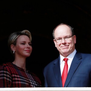 La princesse Charlene et le prince Albert II de Monaco au balcon du palais princier le jour de la célébration de Sainte Dévote à Monaco. Le 27 janvier 2018 © Claudia Albuquerque / Bestimage