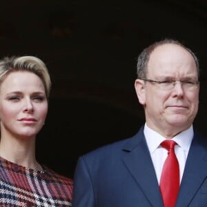 La princesse Charlene et le prince Albert II de Monaco au balcon du palais princier le jour de la célébration de Sainte Dévote à Monaco. Le 27 janvier 2018 © Claudia Albuquerque / Bestimage