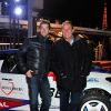 Jean-Pierre Pernaut et son fils Olivier posent devant leur Citroen C4 lors de la conference de presse de la 25eme edition du Trophee Andros a Paris le 27 novembre 2013.