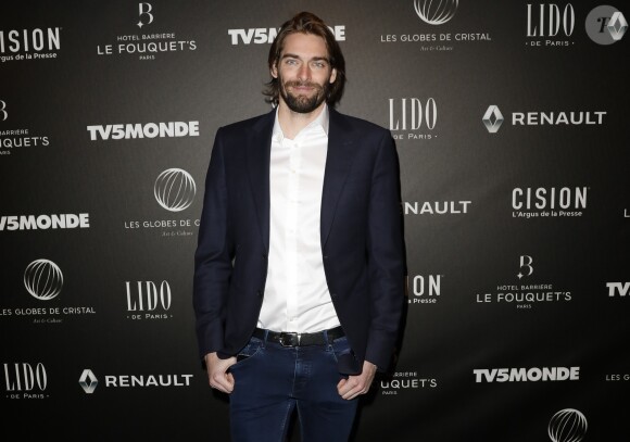 Camille Lacourt - Photocall - 12ème cérémonie des Globes de Cristal au Lido à Paris, le 12 février 2018. © Rachid Bellak / Pool / Bestimage