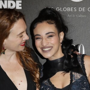 Laetitia Dosch et Camélia Jordana - Photocall - 12ème cérémonie des Globes de Cristal au Lido à Paris, le 12 février 2018. © Rachid Bellak / Pool / Bestimage