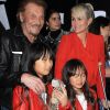 Johnny Hallyday, sa femme Laeticia et leurs filles Jade et Joy au vernissage de l'exposition du photographe Mathieu Cesar à Los Angeles. Le 21 février 2017.