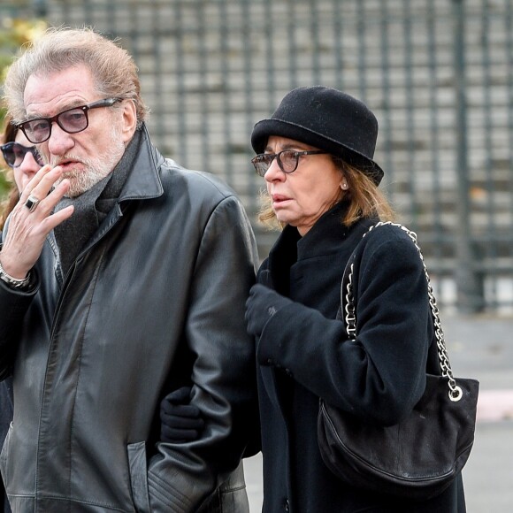 Eddy Mitchell, sa femme Muriel - Sorties de l'église de la Madeleine après les obsèques de Johnny Hallyday à Paris, le 9 décembre 2017. © Coadic Guirec/Bestimage