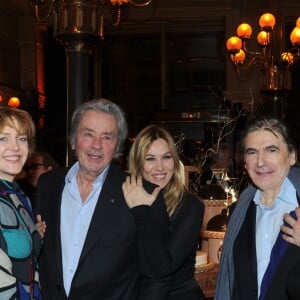 Exclusif - Francis Cabrel, Agnes Soral, Alain Delon, Mathilde Seigner, Serge Lama, sa femme Michèle (Michèle Chauvier) et leur fils Frederic - Serge Lama a fêté son 70eme anniversaire entouré de ses proches au restaurant "Le Grand Colbert" à Paris, apres avoir triomphé sur la scène de l'Olympia pour ses 50 ans de carriere. Le 11 fevrier 2013.