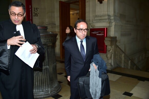 Faouzi Lamdaoui, ancien conseiller de François Hollande arrive avec son avocat Ardavan Amir-Aslani pour son procès pour abus de biens sociaux (en 2007 et 2008) au tribunal correctionnel au plais de justice de Paris, le 5 octobre 2015.
