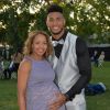 Exclusif - Tony Yoka et sa comapgne Estelle Mossely (enceinte, habillée par Christophe Guillarmé) - Les célébrités lors grand concert de l'Orchestre National de France au Champs de Mars présenté par S. Bern sur France 2 pour célébrer la Fête Nationale à Paris le 14 juillet 2017 © Giancarlo Gorassini / Pierre Perusseau / Veeren / Bestimage