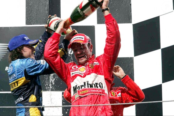 Rubens Barrichel, Michael Schumacher et Fernando Alonso à Budapest en 2004.