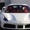 Blac Chyna sort du "Envy Salon and Spa" et regagne sa Ferrari sur le parking à Los Angeles, le 19 avril 2018.