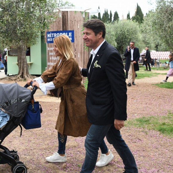 Exclusif - Christian Estrosi, le maire de Nice, et sa femme Laura Tenoudji avec leur fille Bianca - Christian Estrosi (le maire de Nice) et sa femme Laura Tenoudji ont fêté en famille le 1er mai dans les jardins de Cimiez pour la Fête des Mai à Nice, le 1er mai 2018. © Bruno Bebert/Bestimage