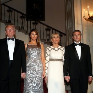 Le président américain Donald Trump, sa femme la Première Dame Melania Trump, le président de la République française Emmanuel Macron et sa femme la Première Dame Brigitte Macron (Trogneux) - Dîner en l'honneur du président de la République française et sa femme la première dame à la Maison Blanche à Washington, The District, Etats-Unis, le 24 avril 2018. © Dominique Jacovides/Bestimage