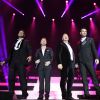 Keith Duffy, Ronan Keating, Mikey Graham, Shane Lynch - Le groupe Boyzone en concert au Wembley Arena a Londres, le 21 decembre 2013.