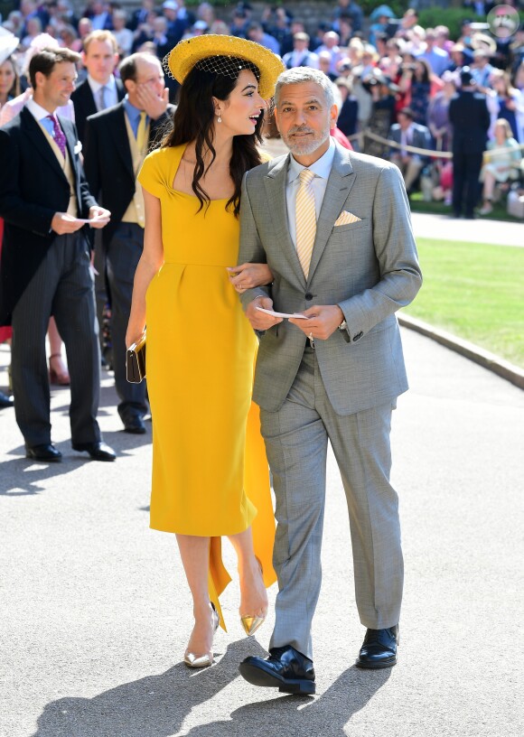 George Clooney et sa femme Amal arrivent à la chapelle S. George pour le mariage du prince Harry et de Meghan Markle au château de Windsor, Royaume Uni, le 19 mai 2018.