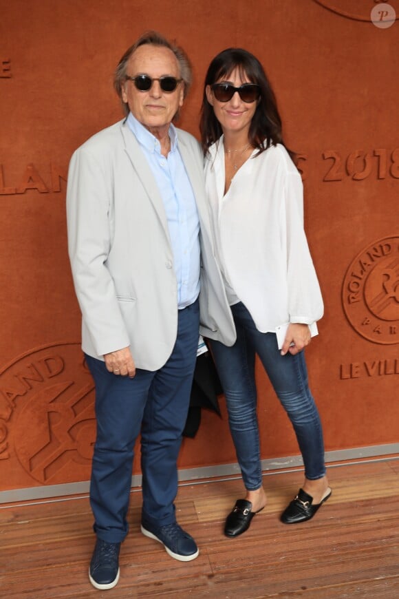 Alexandre Arcady et sa compagne Sabrina Guigui au village lors des internationaux de tennis de Roland Garros, jour , à Paris le 28 mai 2018. © Cyril Moreau / Dominique Jacovides / Bestimage  Celebs during the 2018 French Open - Day two at Roland Garros in Paris, France on May 28th, 2018.28/05/2018 - Paris