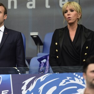 Le président Emmanuel Macron et sa femme Brigitte Macron (Trogneux) (veste Balmain, top Carolina Ritzler, jeans Maje, chaussures Louboutin) - Finale de la coupe de France de football entre le PSG et Angers ( Victoire du PSG 1-0) au Stade de France, saint-Denis le 27 mai 2017