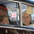 Le prince George de Cambridge, Le prince William, duc de Cambridge, et Catherine (Kate) Middleton, duchesse de Cambridge - Les invités à la sortie de la chapelle St. George au château de Windsor, Royaume Uni, le 19 mai 2018.