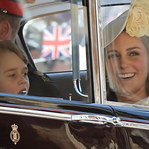 Le prince George de Cambridge, Le prince William, duc de Cambridge, et Catherine (Kate) Middleton, duchesse de Cambridge - Les invités à la sortie de la chapelle St. George au château de Windsor, Royaume Uni, le 19 mai 2018.