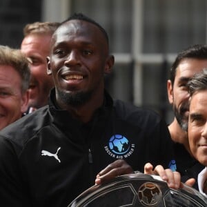 Usian Bolt et Robbie Williams - Réception au 10 Downing Street, pour parler du match caritatif Soccer Aid for Unicef, à Londres, le 6 juin 2018.