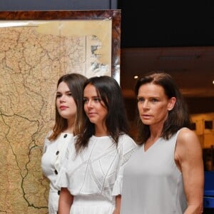 Camille Gottlieb, Pauline Ducruet et la princesse Stéphanie de Monaco - Présentation de la carte routière restaurée ayant appartenu au prince Albert 1er de Monaco et présentation du nouveau modèle de montre Tag Heuer Monaco Gulf édition spéciale 50e anniversaire, au musée de la collection des voitures anciennes du prince de Monaco le 12 juin 2018. © Bruno Bebert/Bestimage