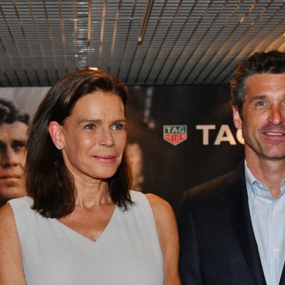 Jack Heuer, la princesse Stéphanie de Monaco et Patrick Dempsey - Présentation de la carte routière restaurée ayant appartenu au prince Albert 1er de Monaco et présentation du nouveau modèle de montre Tag Heuer Monaco Gulf édition spéciale 50e anniversaire, au musée de la collection des voitures anciennes du prince de Monaco le 12 juin 2018. © Bruno Bebert/Bestimage