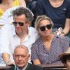 Arthur Sadoun et sa femme Anne-Sophie Lapix - People dans les tribunes des Internationaux de France de Tennis de Roland Garros à Paris. Le 9 juin 2018 © Cyril Moreau / Bestimage