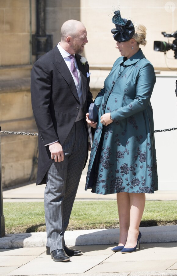 Mike Tindall et sa femme Zara Phillips Tindall, alors enceinte de leur fille Lena, au mariage du prince Harry et de Meghan Markle le 19 mai 2018 à Windsor.