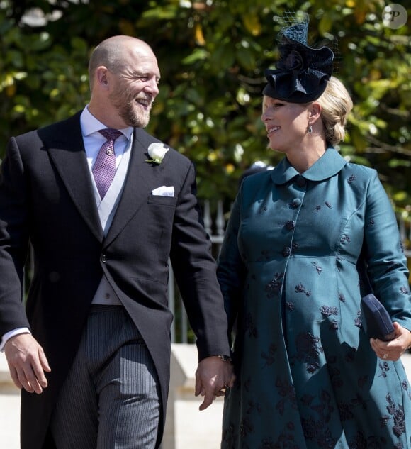 Mike Tindall et sa femme Zara Phillips Tindall, alors enceinte de leur fille Lena, au mariage du prince Harry et de Meghan Markle le 19 mai 2018 à Windsor.