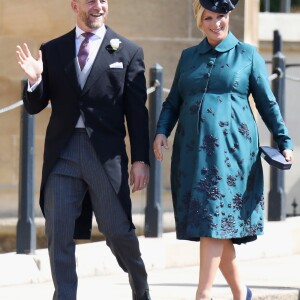 Mike Tindall et sa femme Zara Phillips Tindall, alors enceinte de leur fille Lena, au mariage du prince Harry et de Meghan Markle le 19 mai 2018 à Windsor.