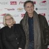 Josiane Balasko et Thierry Lhermitte - 93e Grand Prix d'Amerique à l'Hippodrome de Vincennes, le 26 janvier 2014.