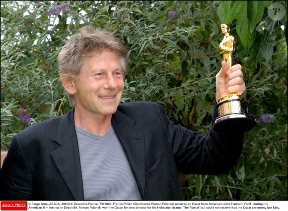 Roman Polanski recevant l'Oscar du meilleur réalisateur pour le film "Le Pianiste" au Festival de Deauville en septembre 2003.