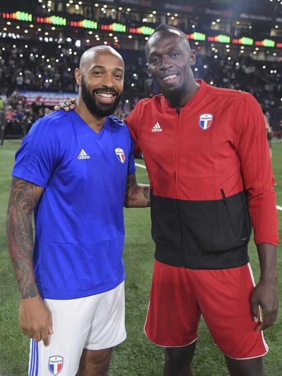 Thierry Henry et Usain Bolt - Les Bleus de France98 se sont imposés (3-2) face à une sélection FIFA 98 pour le match des légendes pour l?anniversaire des 20 ans du sacre mondial à la U Arena à Nanterre, France, le 12 juin 2018. © Bestimage