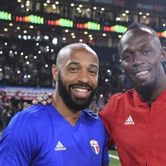 Thierry Henry et Usain Bolt - Les Bleus de France98 se sont imposés (3-2) face à une sélection FIFA 98 pour le match des légendes pour l?anniversaire des 20 ans du sacre mondial à la U Arena à Nanterre, France, le 12 juin 2018. © Bestimage