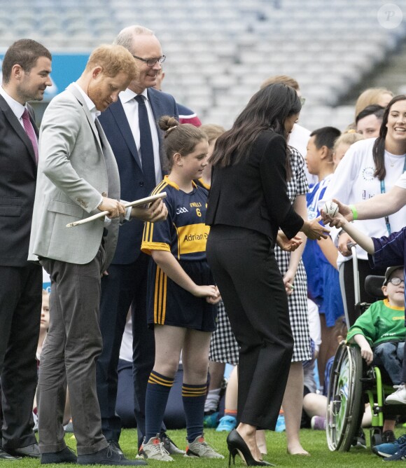 Le prince Harry, duc de Sussex et sa femme Meghan Markle, duchesse de Sussex assistent aux jeux gaélique à Croke Park à Dublin le 11 juillet 2018