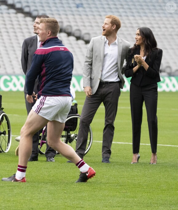 Le prince Harry, duc de Sussex et sa femme Meghan Markle, duchesse de Sussex assistent aux jeux gaélique à Croke Park à Dublin le 11 juillet 2018